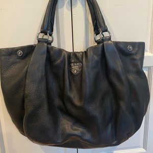 Prada pebbled tote in a perfect size for work or travel